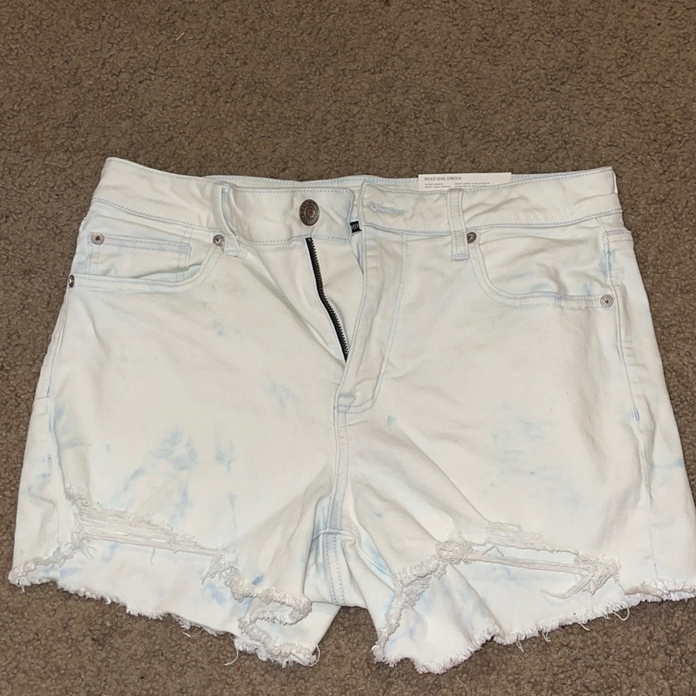 High Rise acid wash jean shorts.